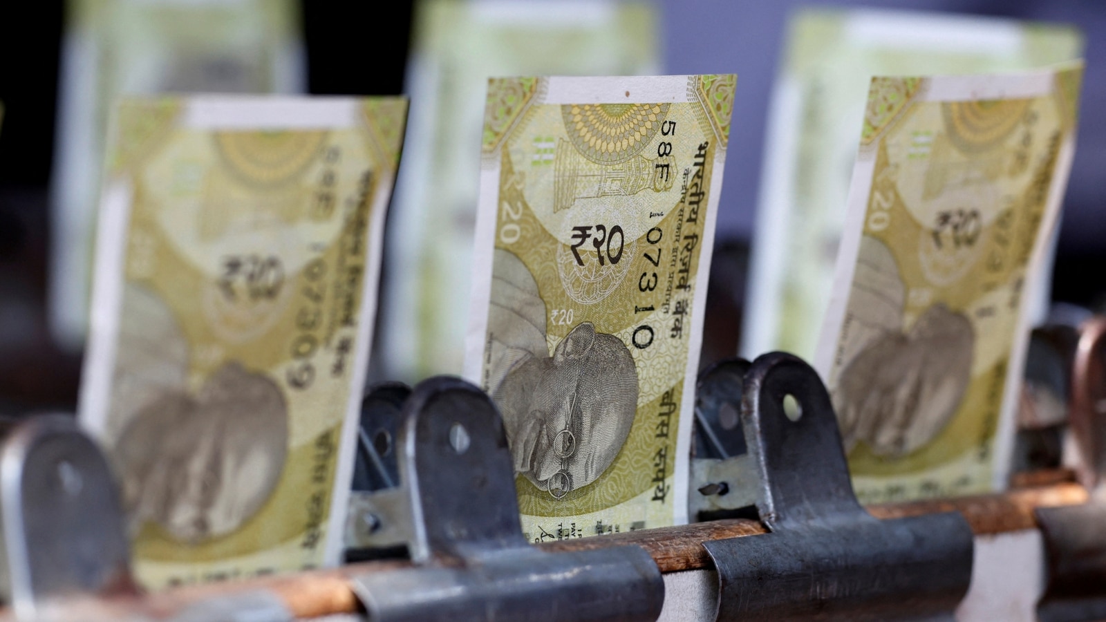Rupee likely to stay range-bound; RBI may raise rates by 50 bps if Fed hikes: Goldman Sachs