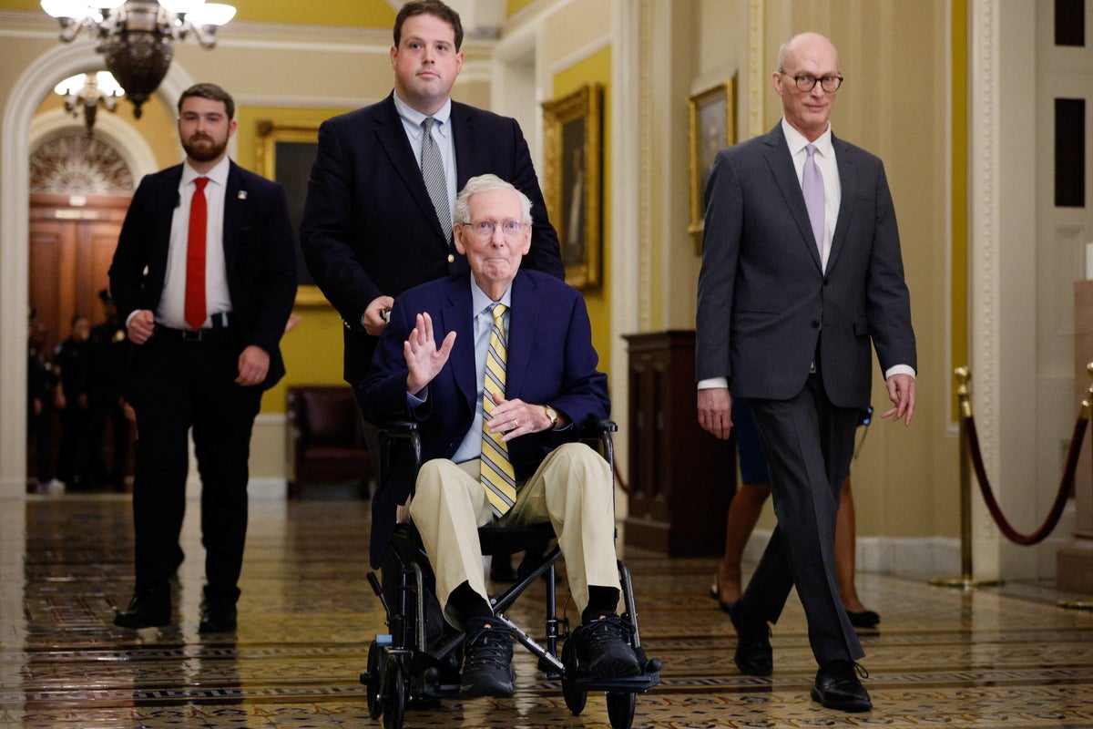 Mitch McConnell back in Senate to cast first vote since disappearing from public life in June