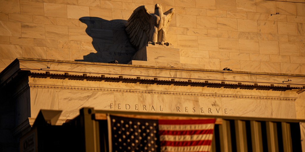 Stocks and bonds rally after Fed hikes rates and oil prices fall