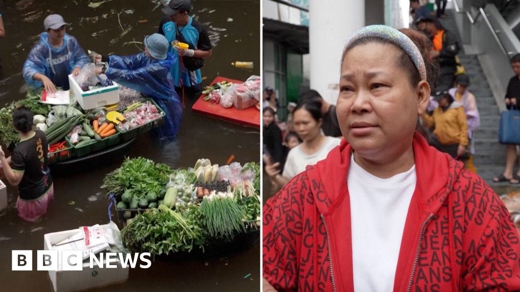 Watch: Bangkok locals create floating market during floods