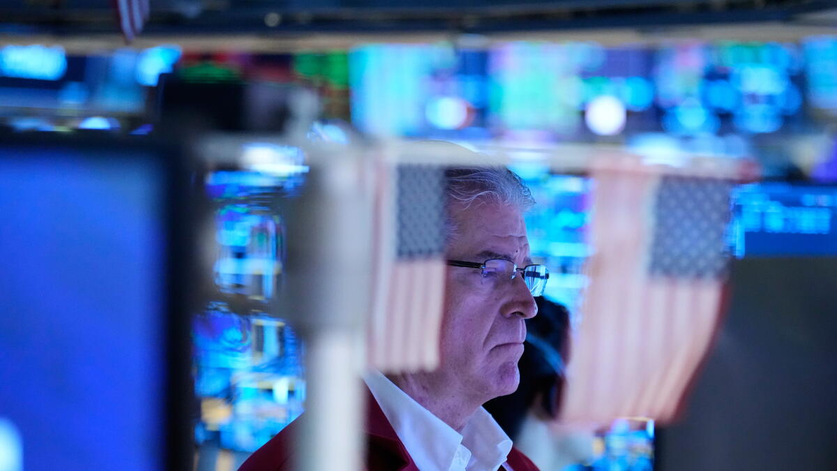 Swings in the bond market shake stock markets worldwide, as AI optimism supports Wall Street