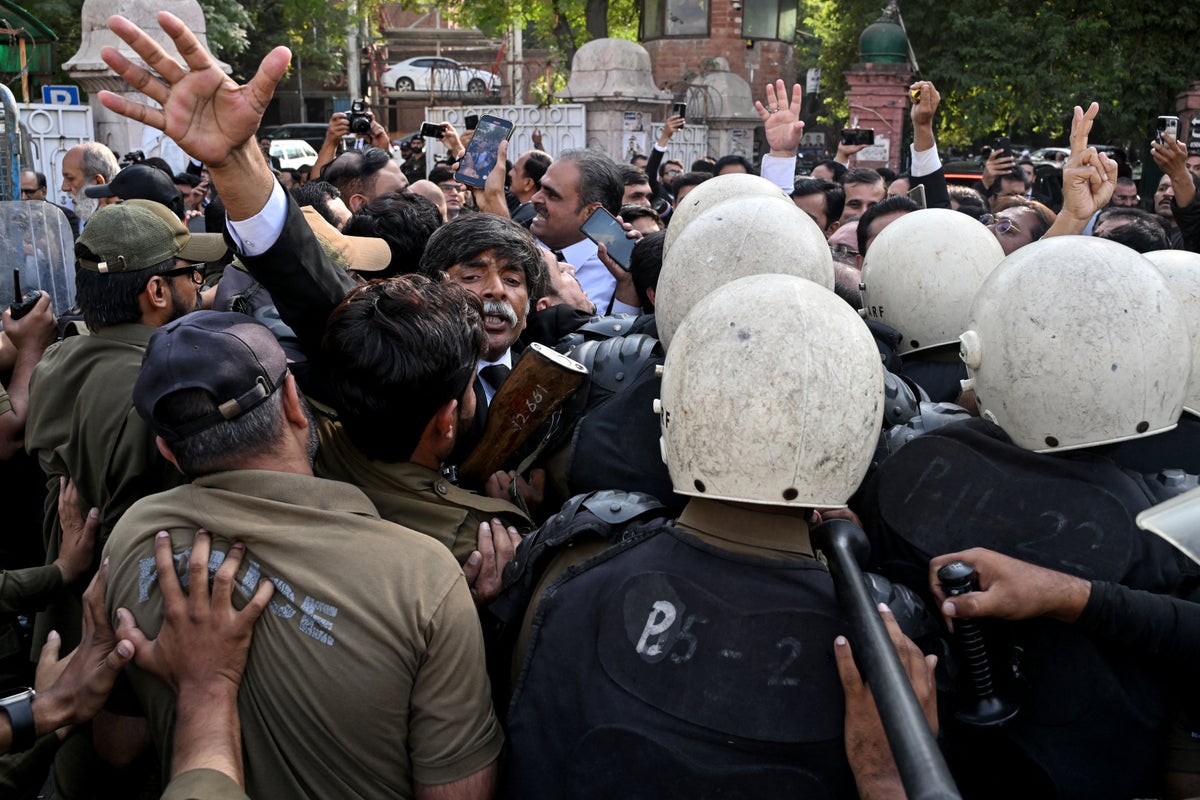 Police accused of opening fire on Imran Khan’s supporters in Pakistan