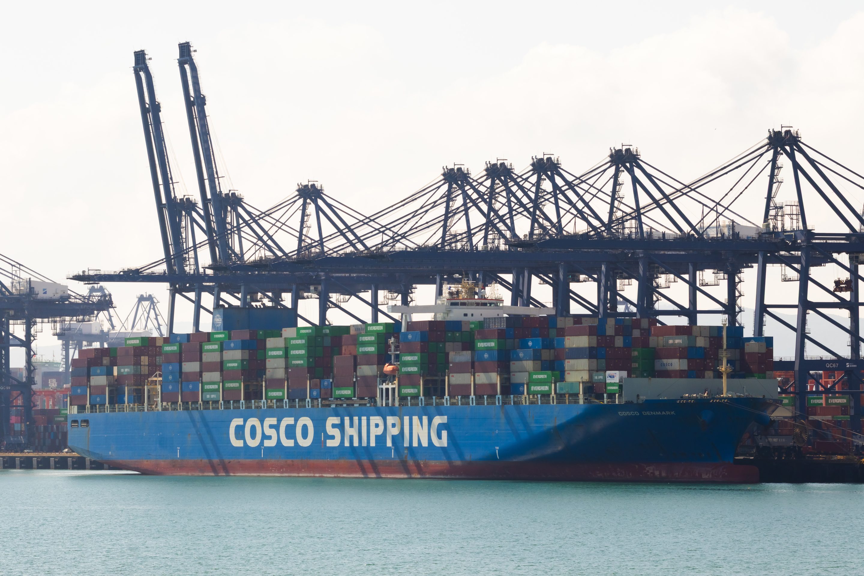China's economy grew 4.5% last quarter, yet its export boom risks being 'a drag on world growth'