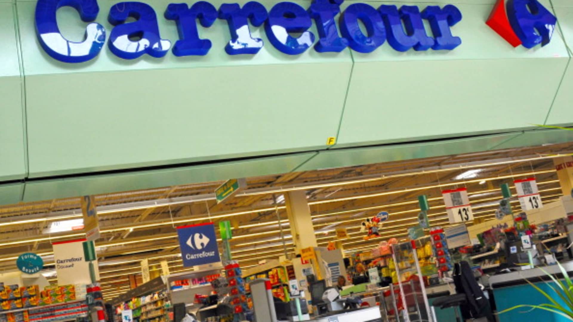 French supermarket giant's shares plunge 12% after warning ‘unprecedented’ unrest will hit business