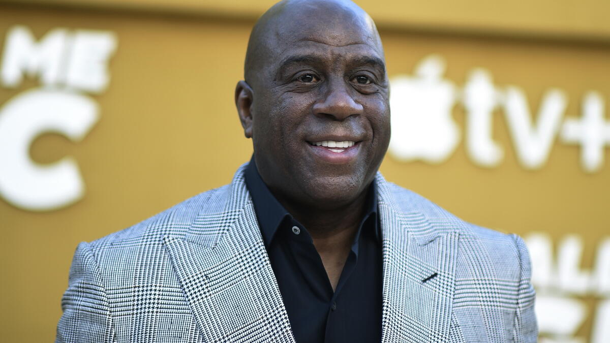 After federal subpoenas, Mark Walter tapped a Magic Johnson-linked firm for billions in loans
