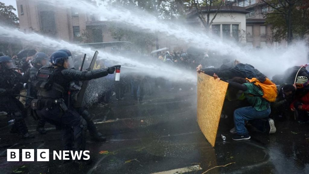 Clashes erupt in Paris after largely peaceful protests across France