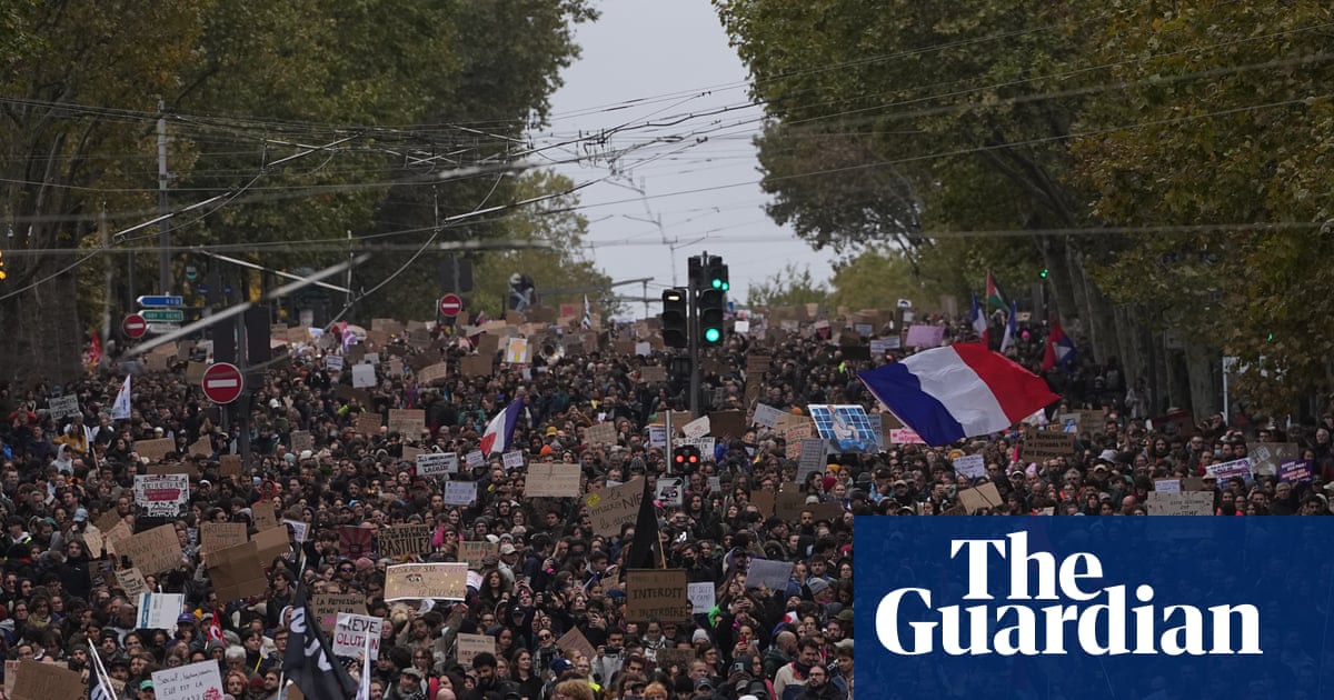 Hundreds of thousands march across France in protests over schools and policing